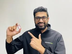 A customer holding a Chargie device